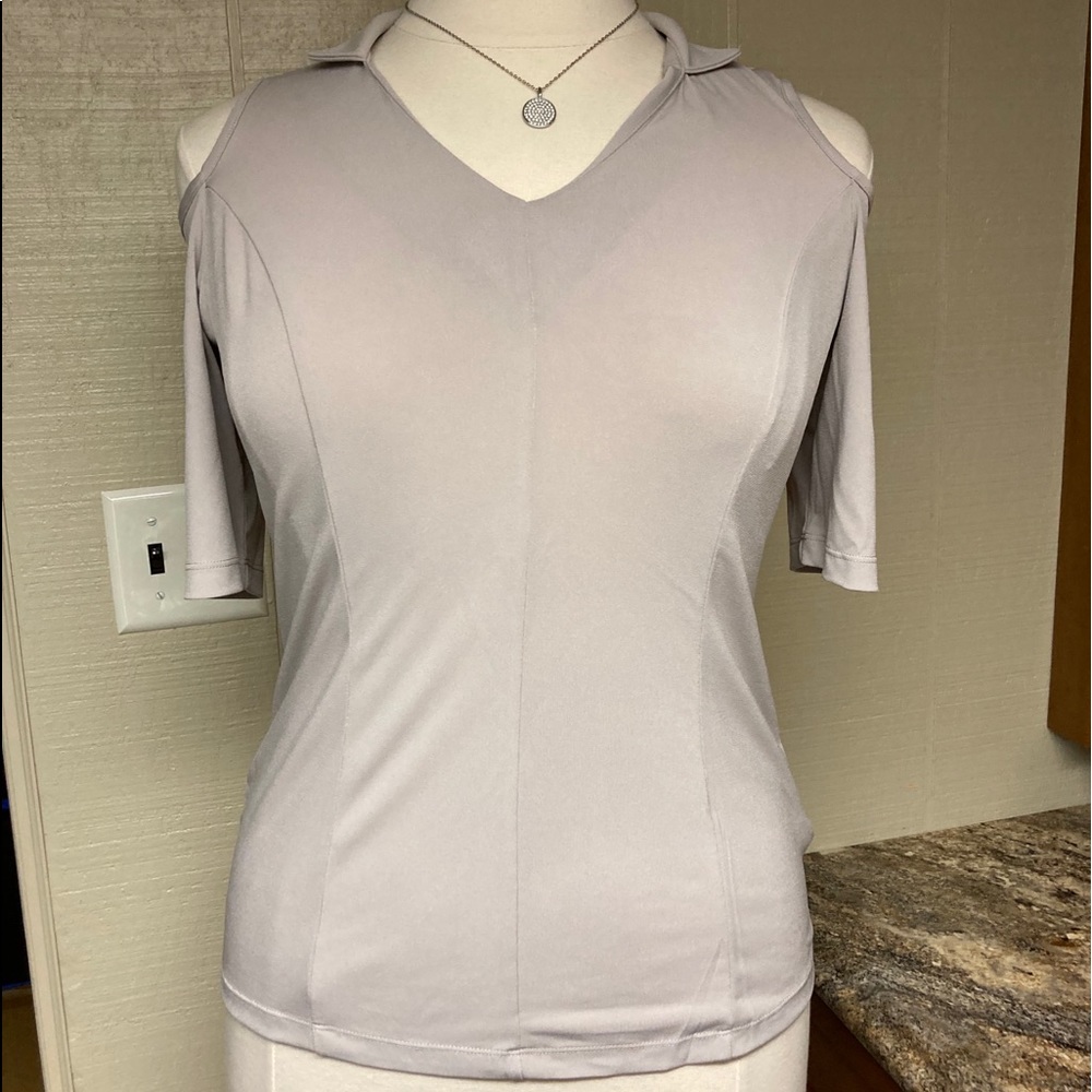 Tan cold shoulder top.